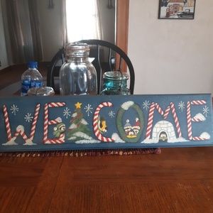Hand-painted holiday sign